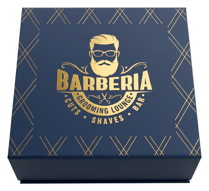 Closed navy Barberia gift box with the gold crest